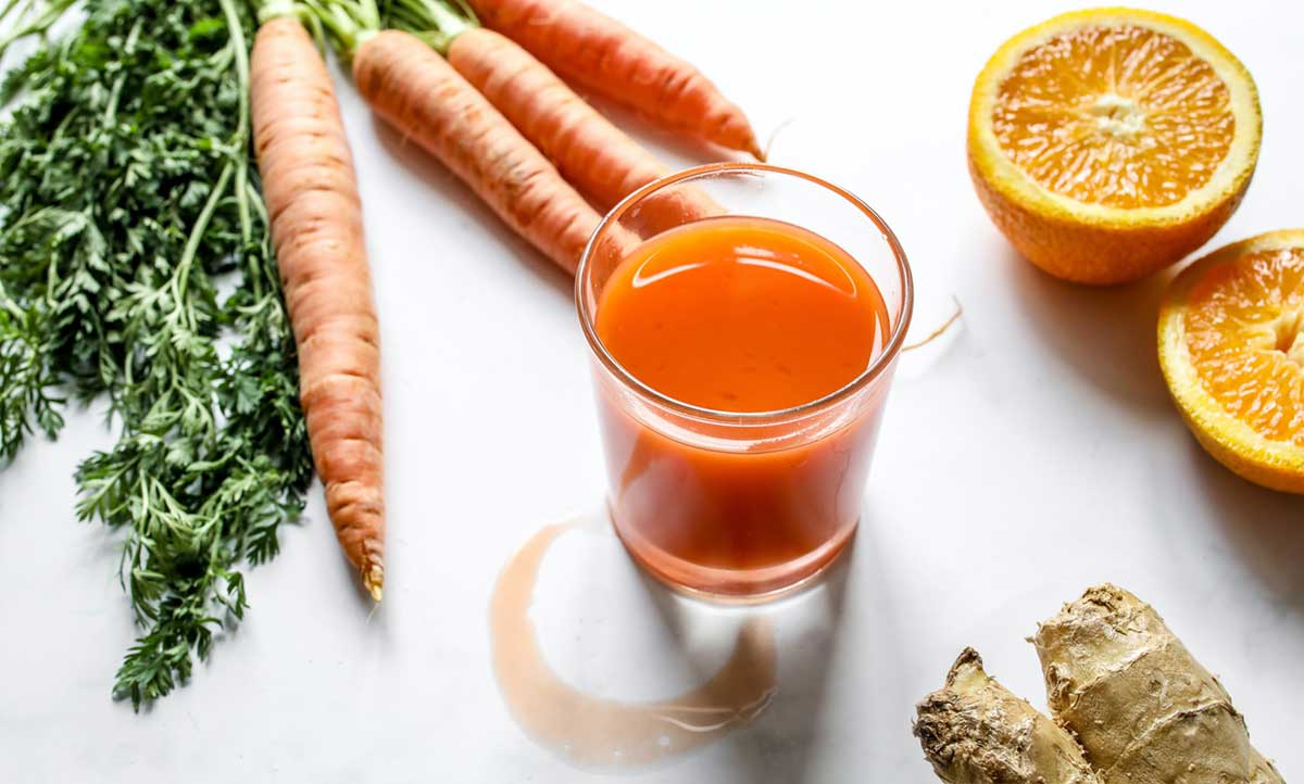 Đầy bụng khó tiêu uống gì tốt cho hệ tiêu hóa? - Nước ép cà rốt 