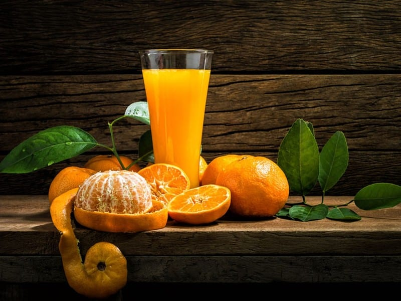 Uống nước cam giúp tăng cường sức khỏe xương, răng và cơ bắp