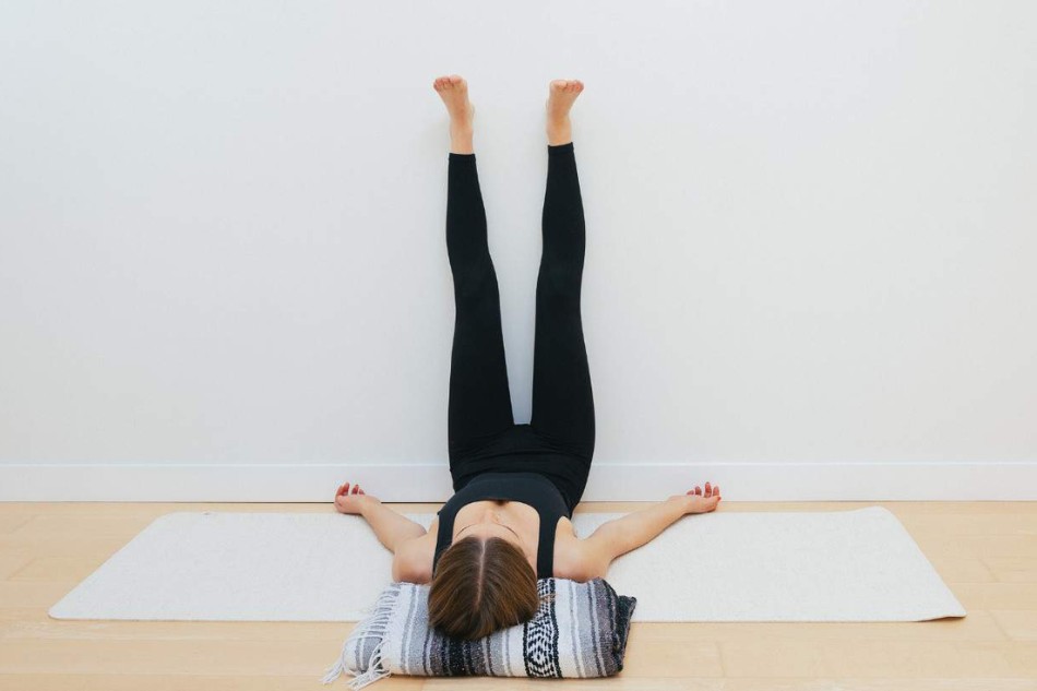 Tập wall legs up hỗ trợ quá trình tăng chiều cao của cơ thể
